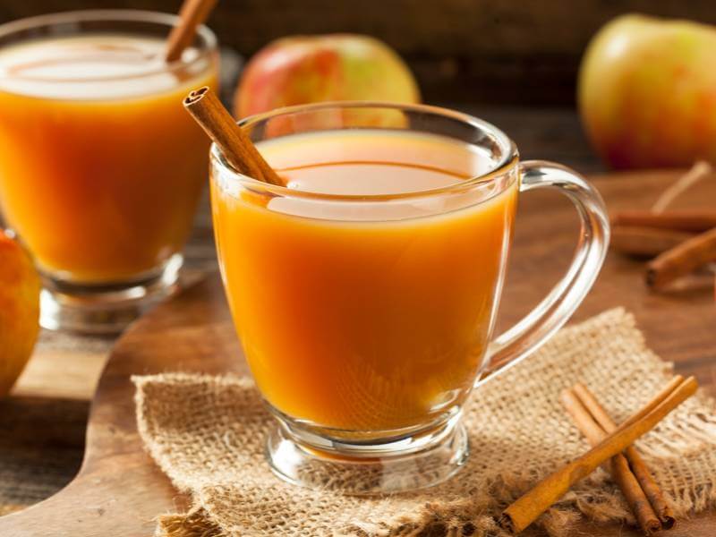 Aromas of Fall Warm Apple Cider with Cinnamon Sticks