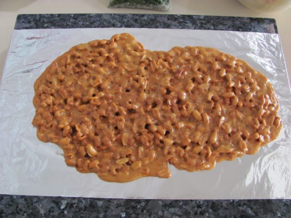 finished peanut brittle on aluminum 