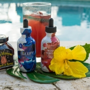 Labor Day Cocktails - poolside cocktail roses for laura rum cranberry peach cherry drink recipe with wild hibiscus flower extracts and sorrel mixology