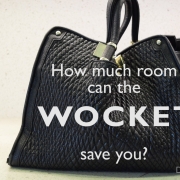 How much room can the Wocket smart wallet save you? Black purse on a white counter top