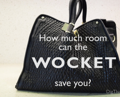 How much room can the Wocket smart wallet save you? Black purse on a white counter top
