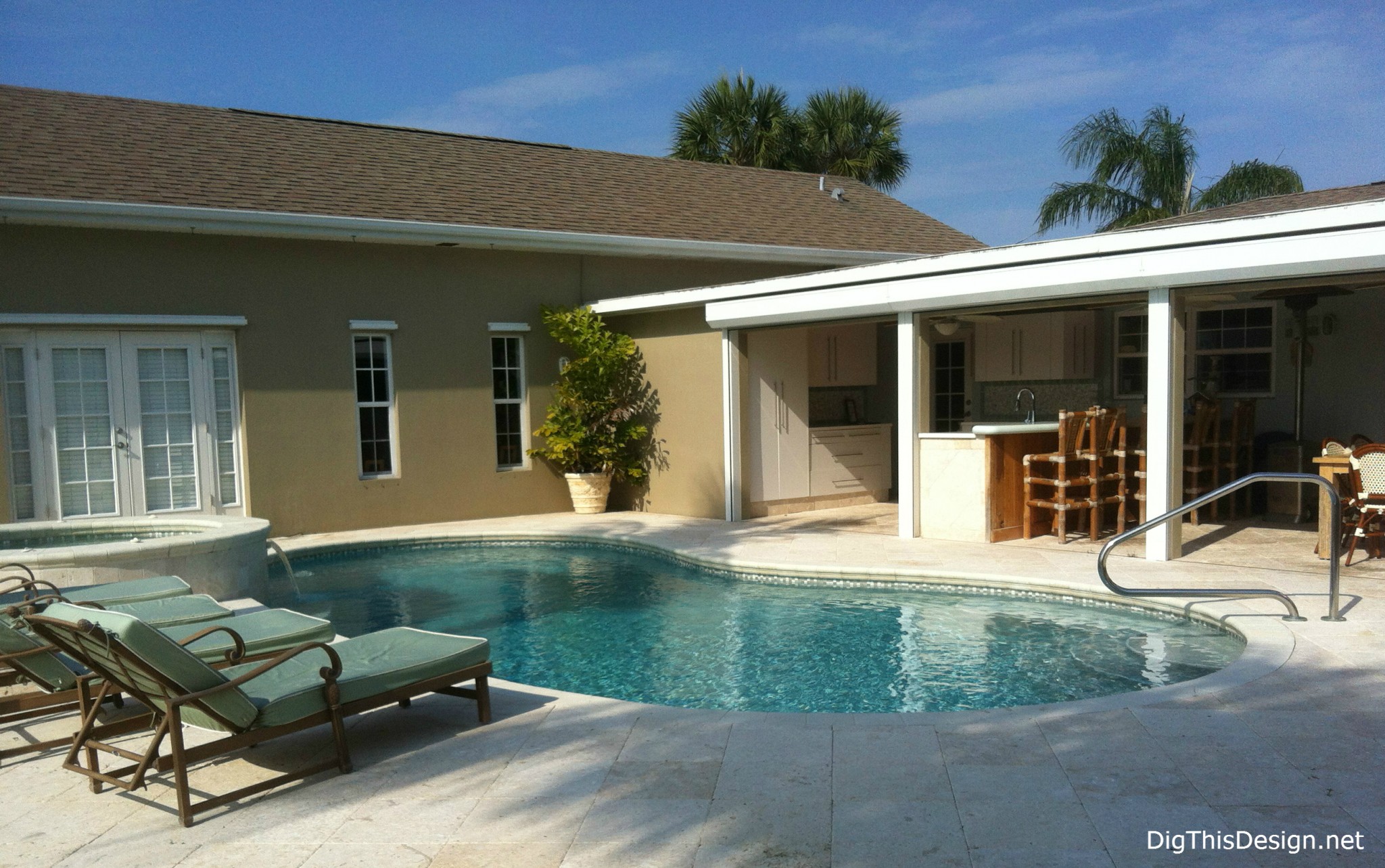 Florida home backyard with kidney pool and hot tub