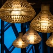 geometric glass pendant lights in blue background