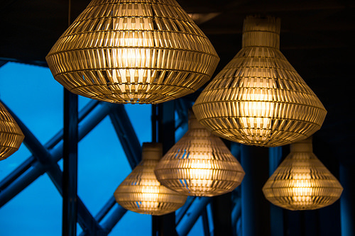 geometric glass pendant lights in blue background