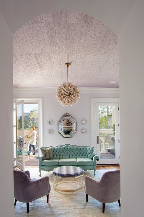Contemporary living room interior design by Rethink Design Studio with victorian antique furniture.