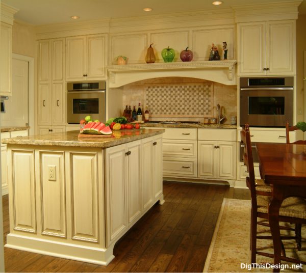 kitchen cooking zone design with hood and range in traditional old world style