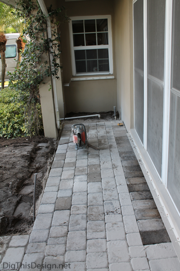 Adding a new paver porch.