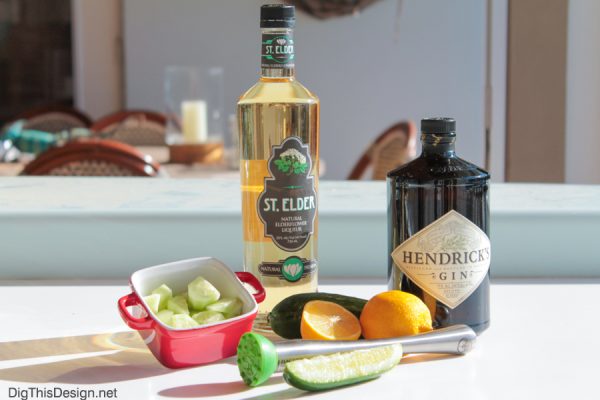 Ingredients for St. Patrick's Day gin and St. Elder elderflowe liquer, cucumber, and lemon.