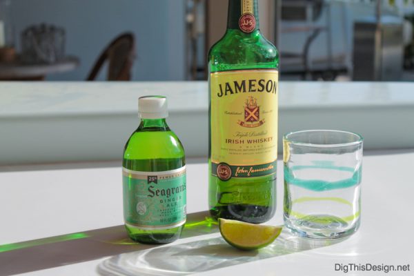 St. Patrick's day drink recipe with Irish whiskey, ginger ale, and a lime wedge.