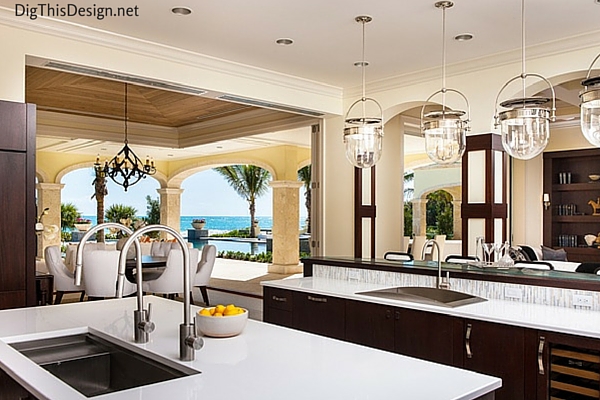 Large decorative pendants over kitchen island by Urban Electric and design by Patricia Davis Brown Designs.