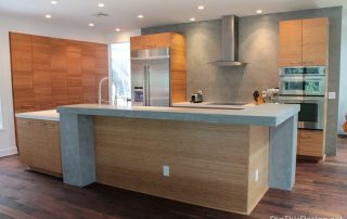 Industrial kitchen design by Patricia Davis Brown Designs, showing a signature wall.