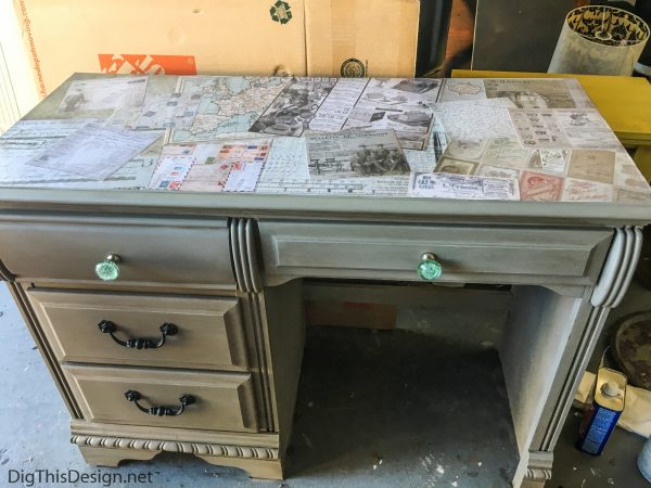 A refurbished desk using the technique of decoupage medium Mod Podge.