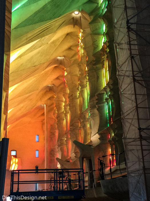 Cascading lighting shinning through the stain glass at La Sagrada Familia