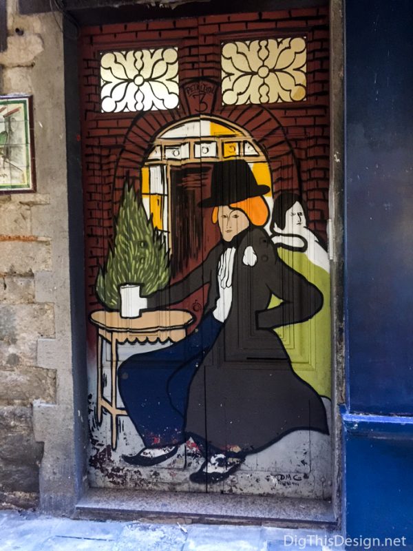 Fine graffiti art on a doorway in Spain.