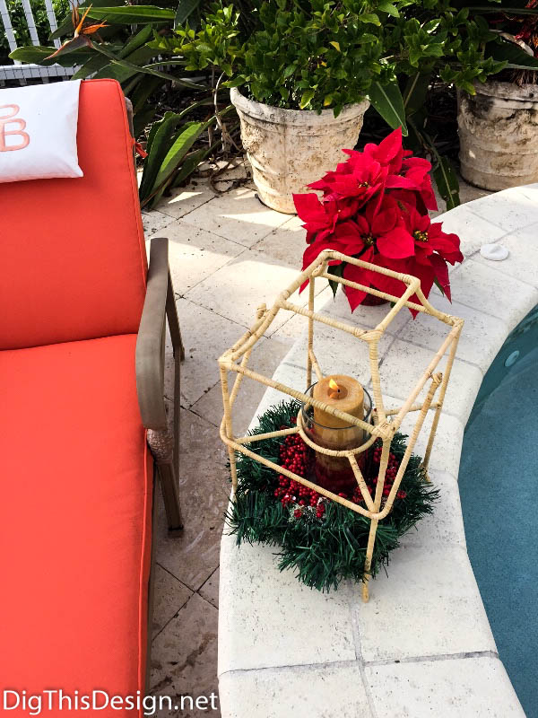 Home Decorating - Poolside lantern embellished for the holidays.