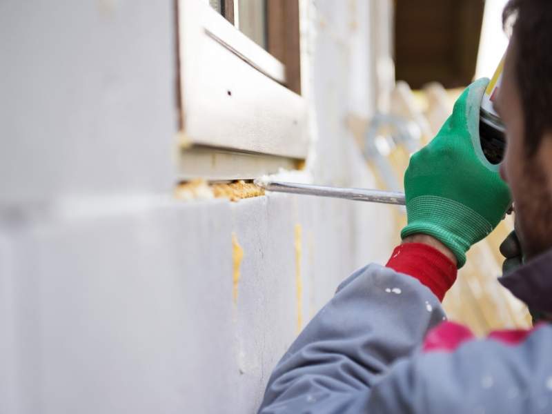 Weather Stripping the Windows for Sustainability