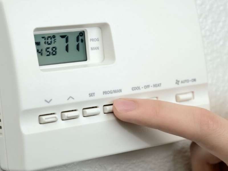 Check the Thermostat Batteries HVAC Repair Technician