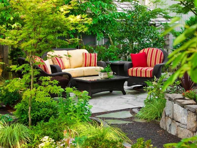 The Relaxing and Surprising Benefits of Owning Garden Furniture - Outdoor rattan furniture on wooden deck