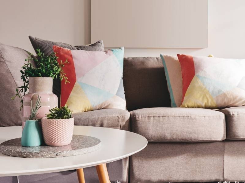 How To Add Color to Your Living Room - bring in colorful cushions