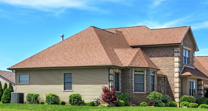 Material Options for Residential Roofs - Home with asphalt roof.