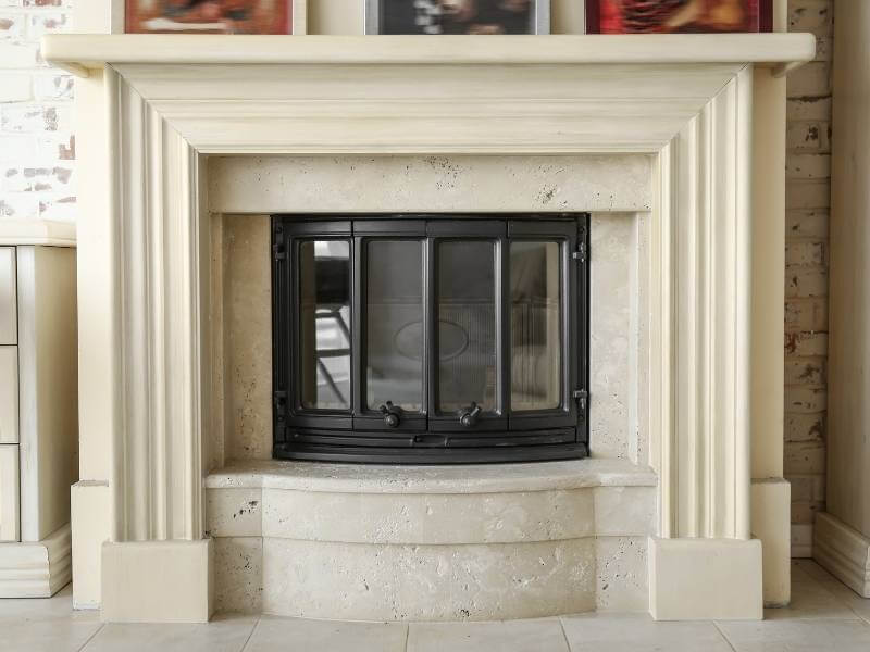 How to Clean Your Fireplace Glass Door and Get Rid of Sticky Soot - White Deco Style Fireplace with Clean Glass Doors.