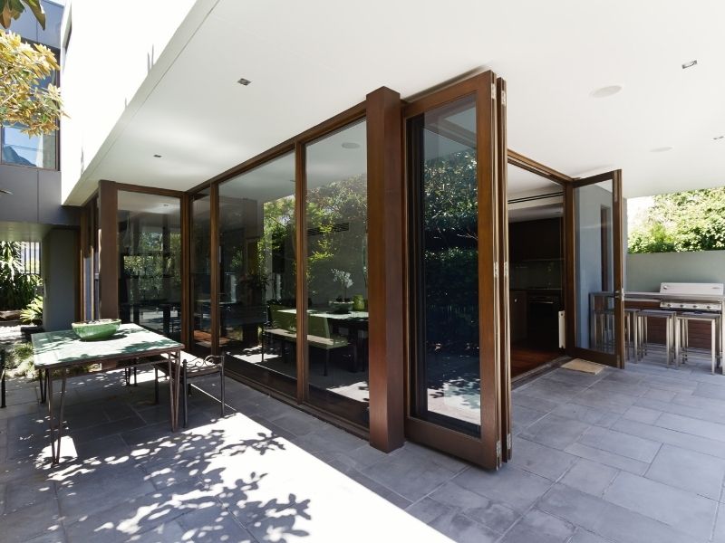 Folding glass doors on patio.